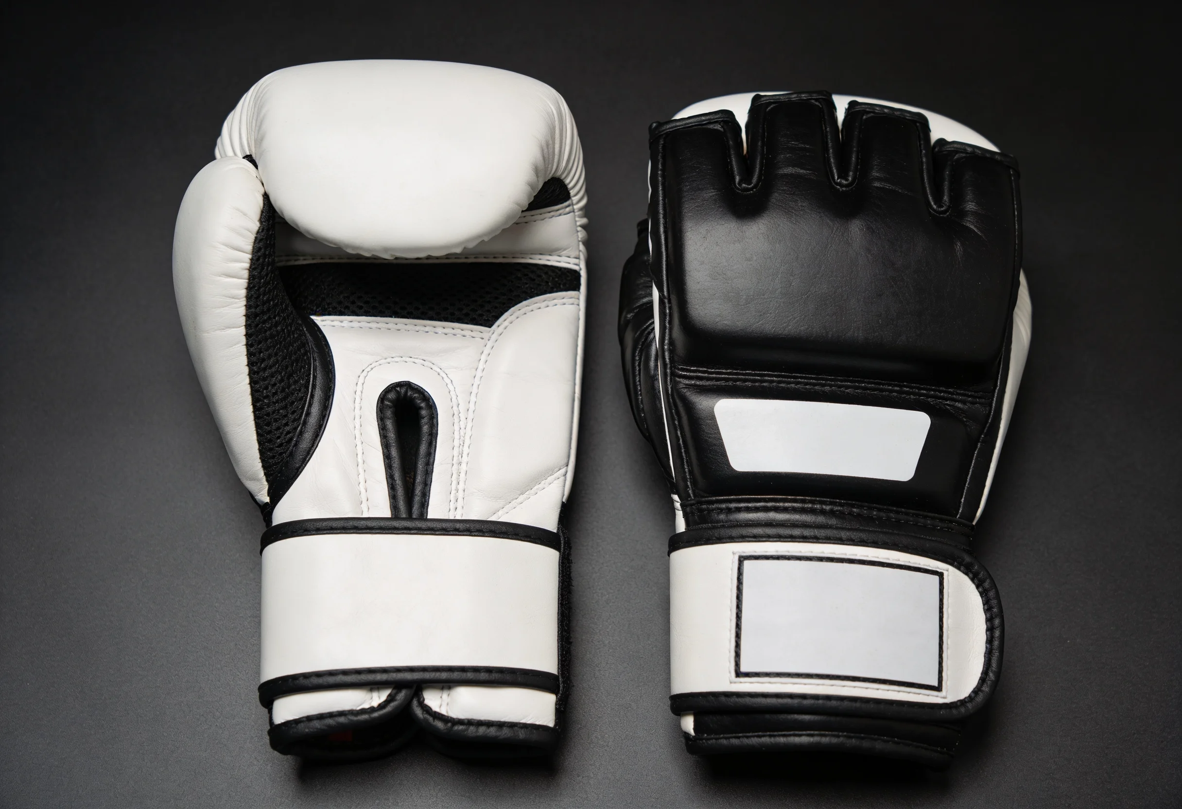 Two UFC gloves placed side by side on a table representing paired outcome options